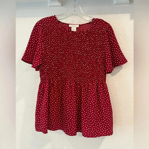 URBAN Romantics Tops - Flowy white dotted top. Color is between red and rust (almost burgundy).